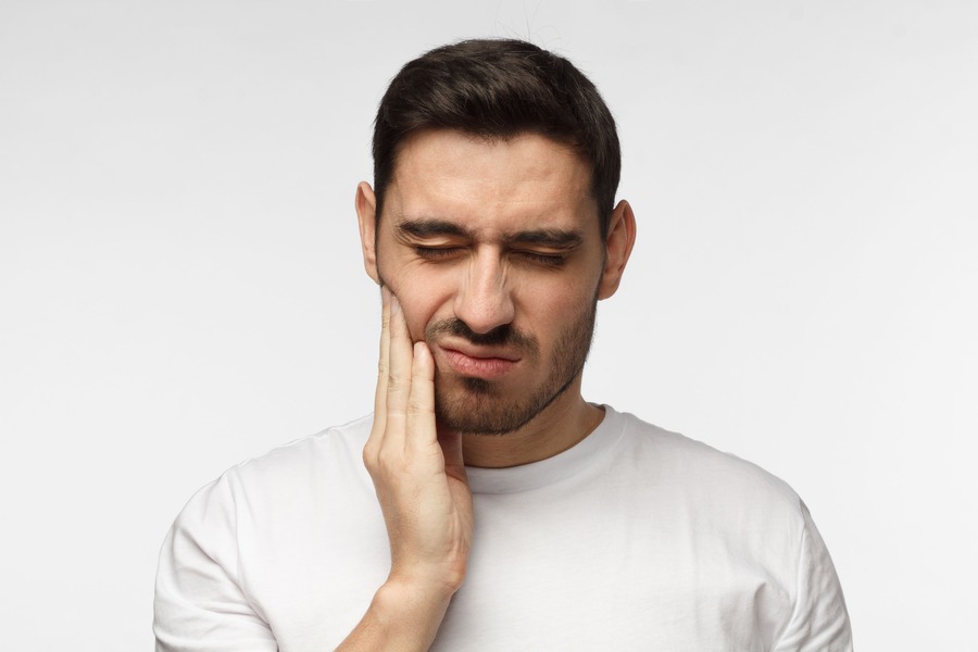 Man experiencing a toothache