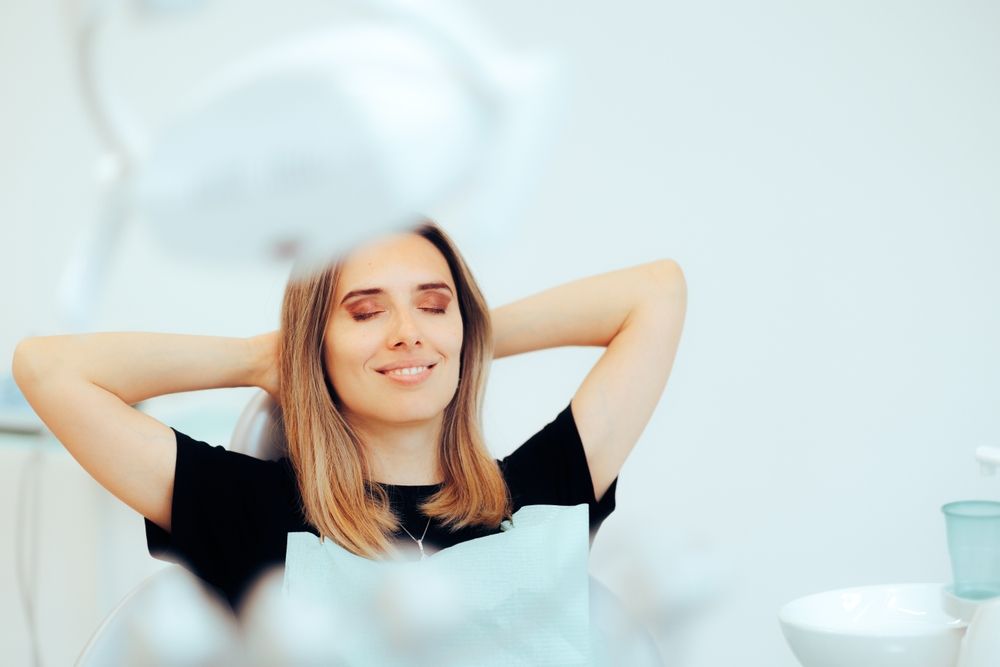 Relaxed patient resting in a dental chair